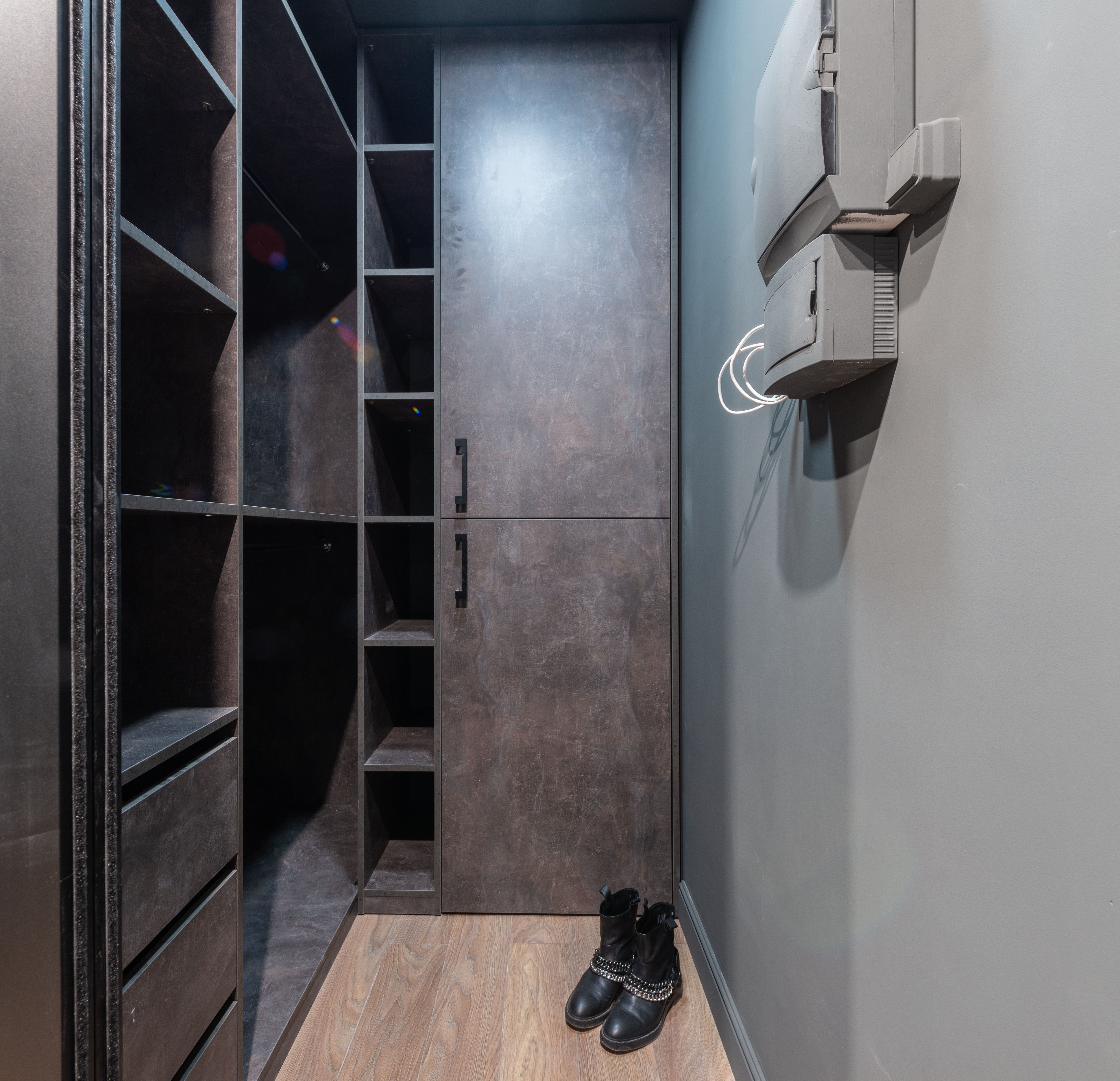 Closet with leather boots display